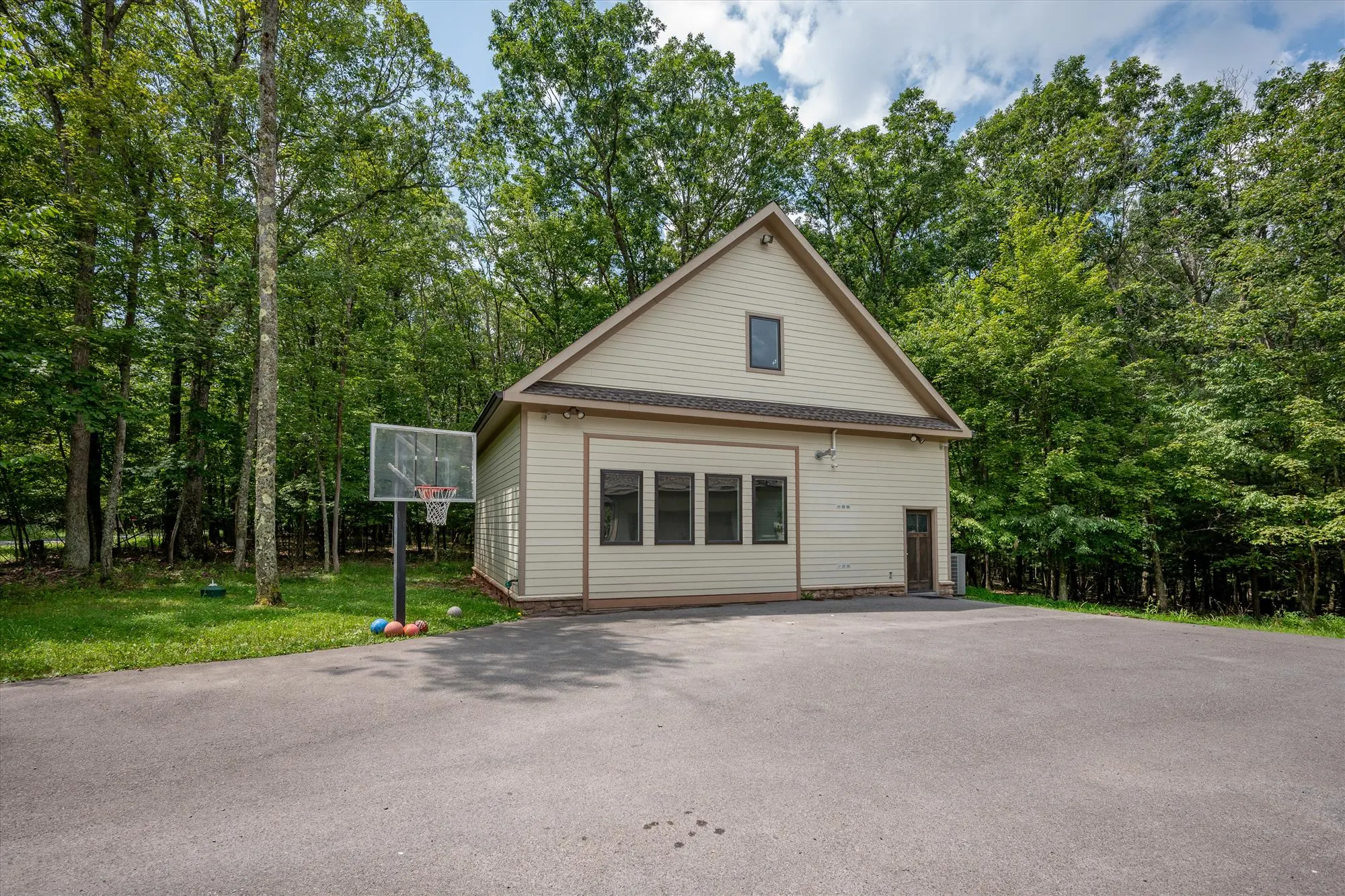 Separate pool house building at Woodland Chalet with private indoor pool