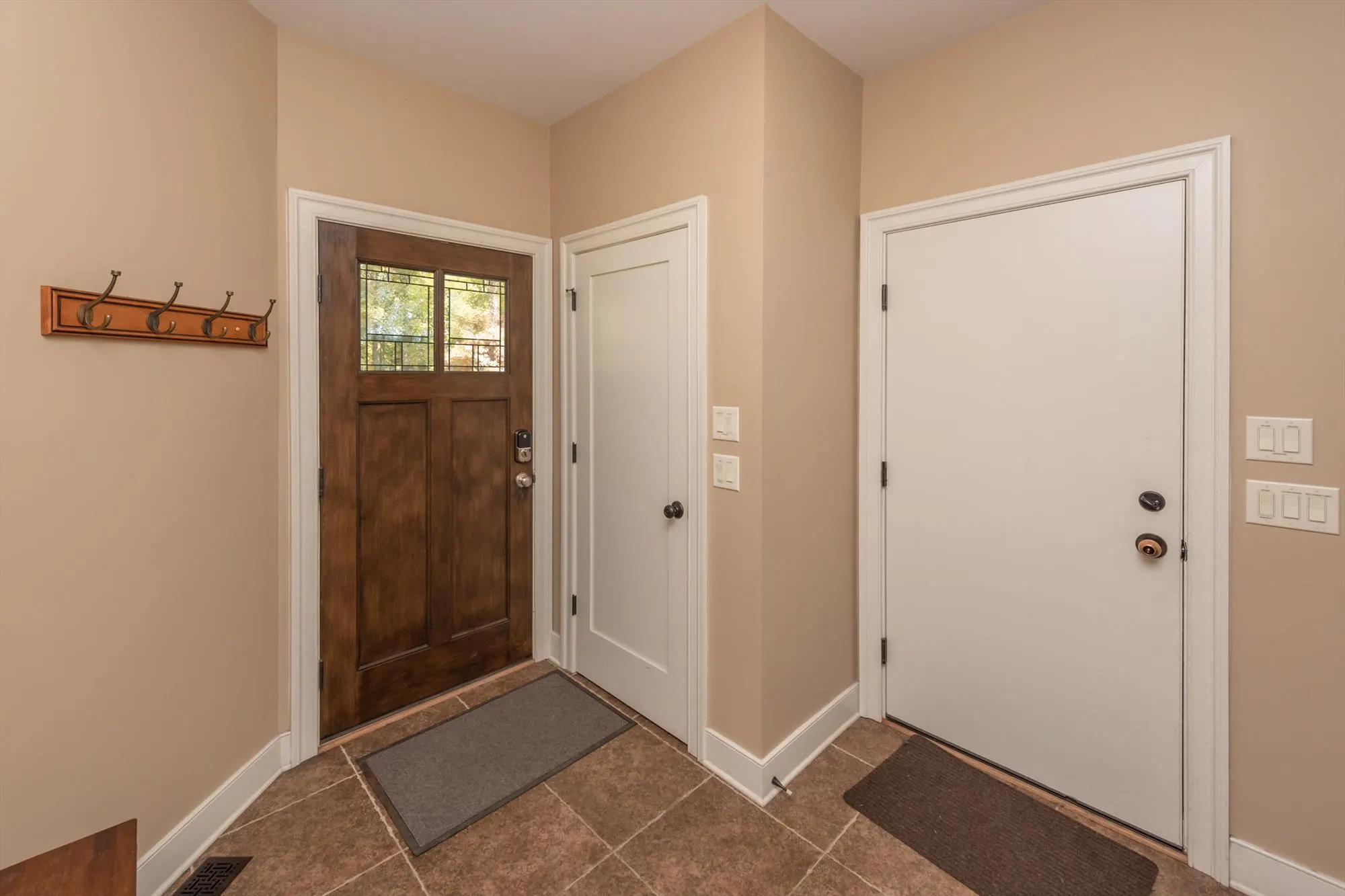 Grand foyer and entryway welcoming guests into Woodland Chalet