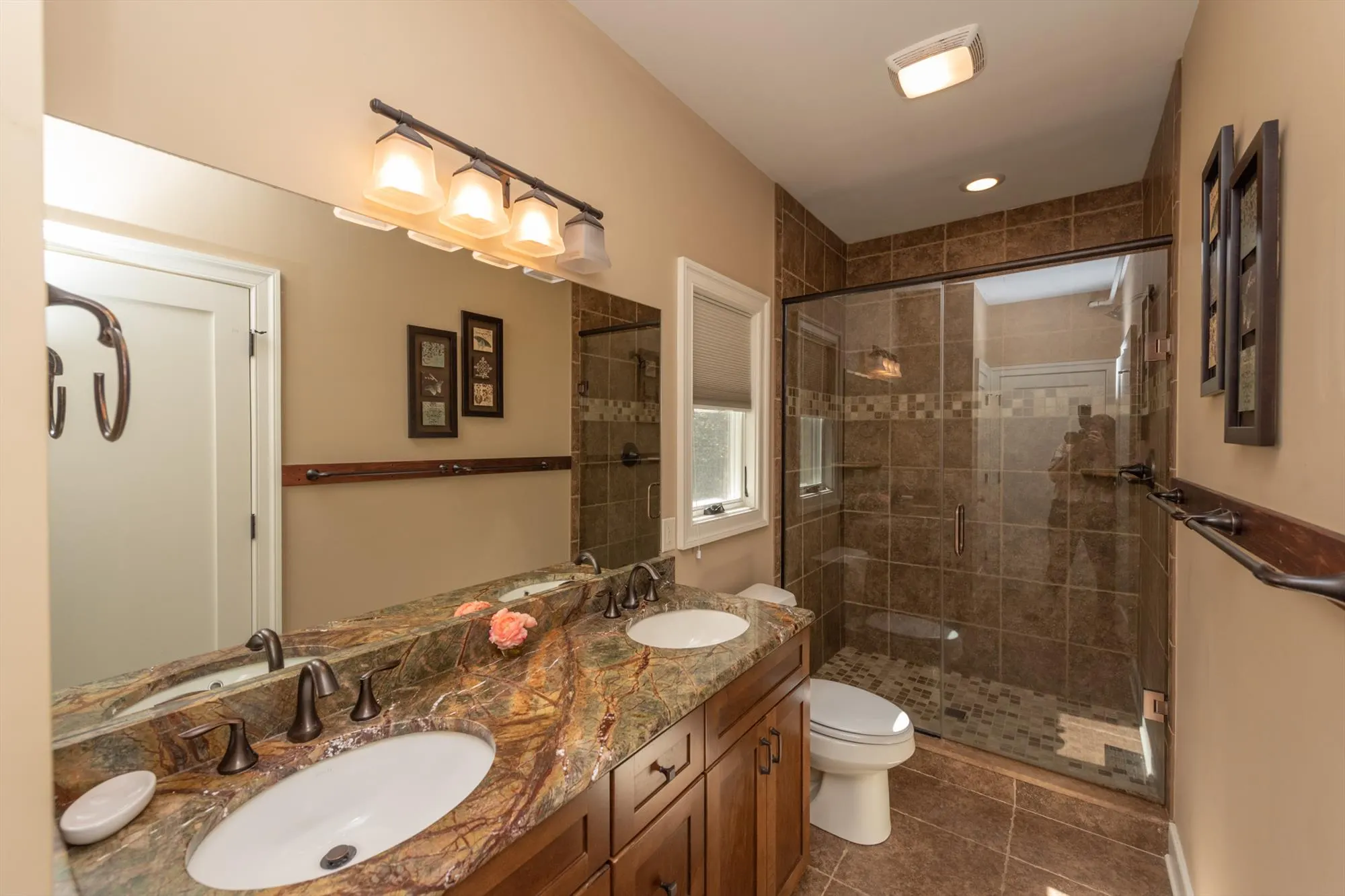 Main level full bathroom with tub-shower combination and vanity