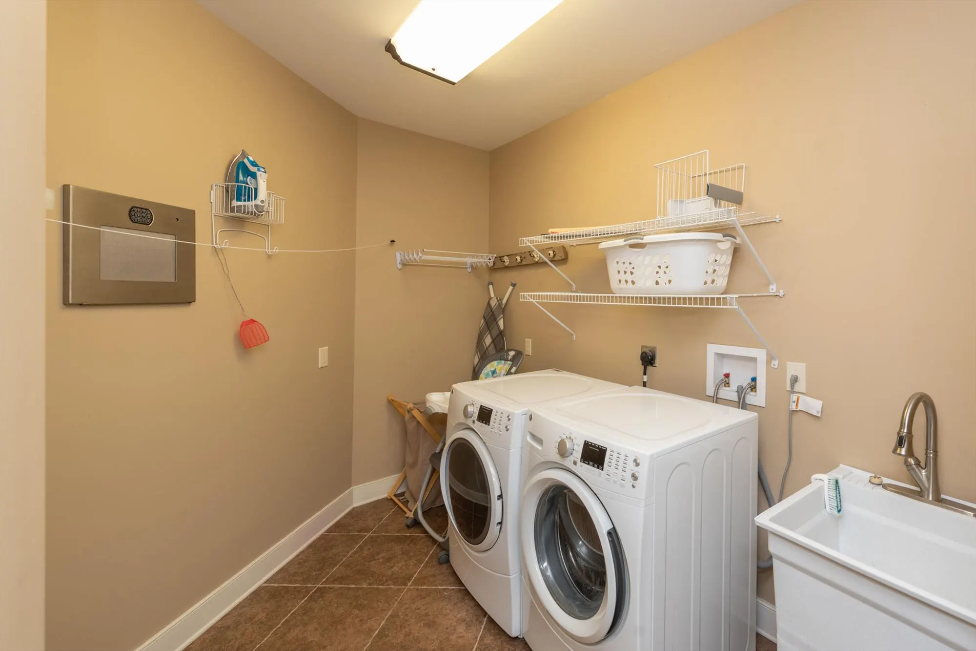 In-unit washer and dryer for guest laundry convenience during longer stays